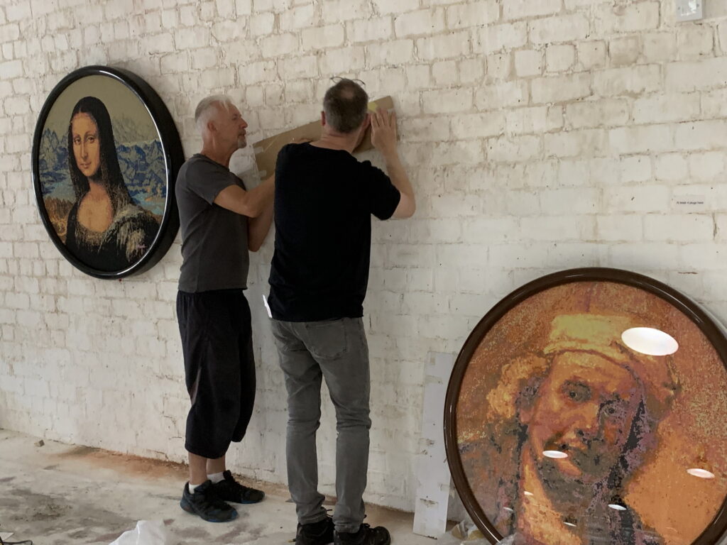 David and Robert Mach hanging Rembrandt