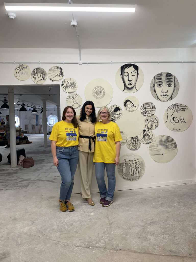 Josie , Yuliia and Rosemary in-front of Alison Harpers Life of the Buddha