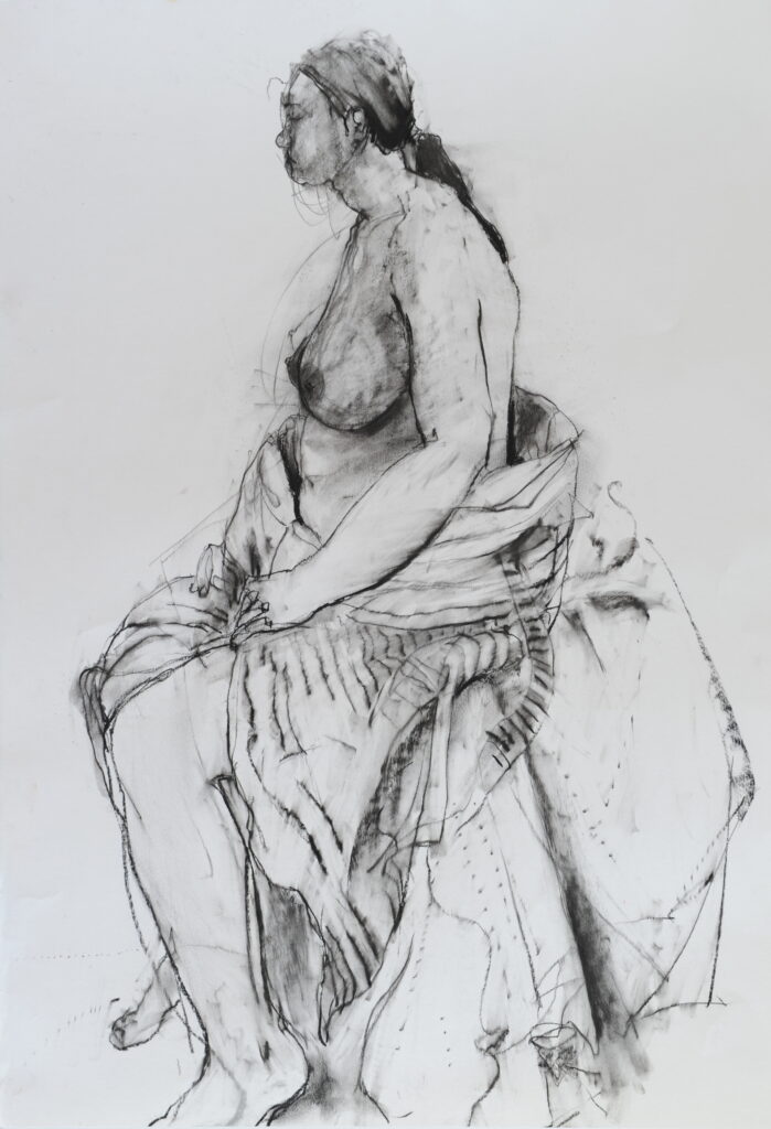 Seated nude. Charcoal on paper.